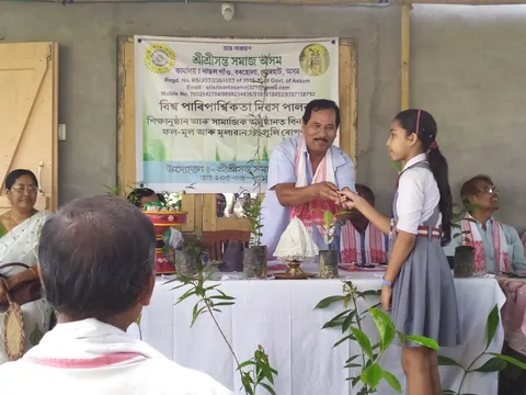 A schoolgirl receiving an award